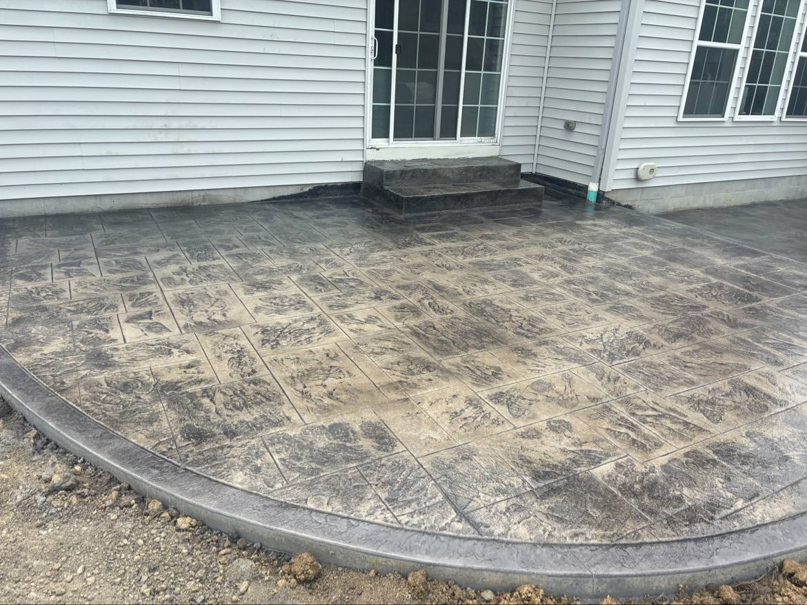 Finished stamped concrete patio with steps